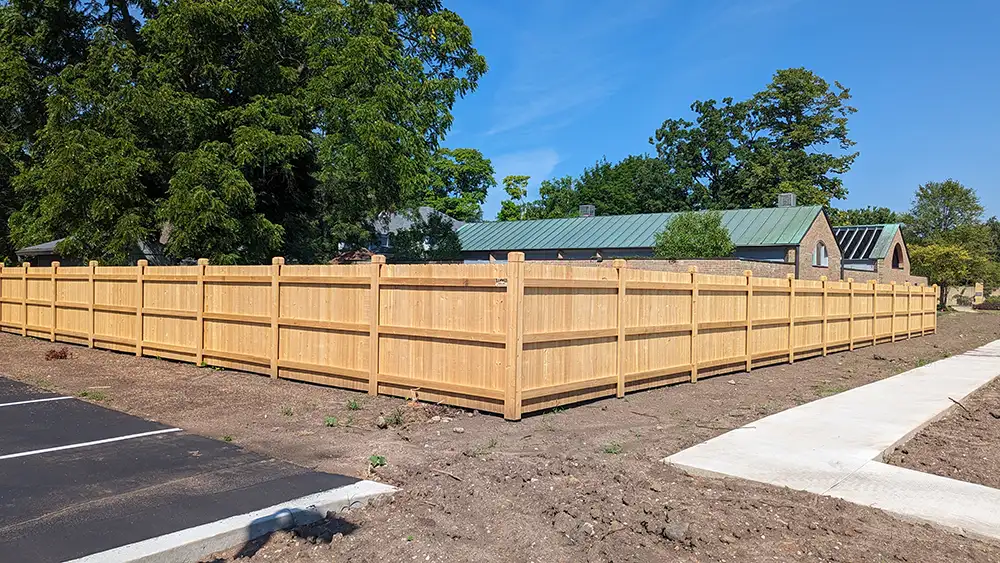 Cedar wood fence around a residential property in Wisconsin.